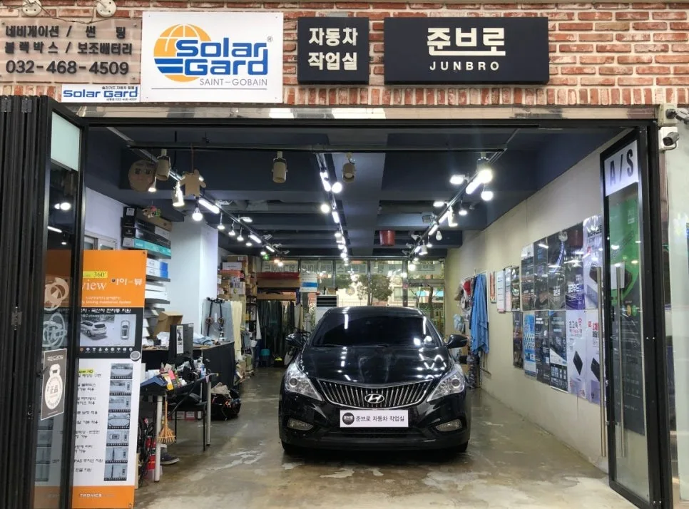 그랜저 HG 안드로이드 올인원, 순정 네비와 무엇이 다를까?