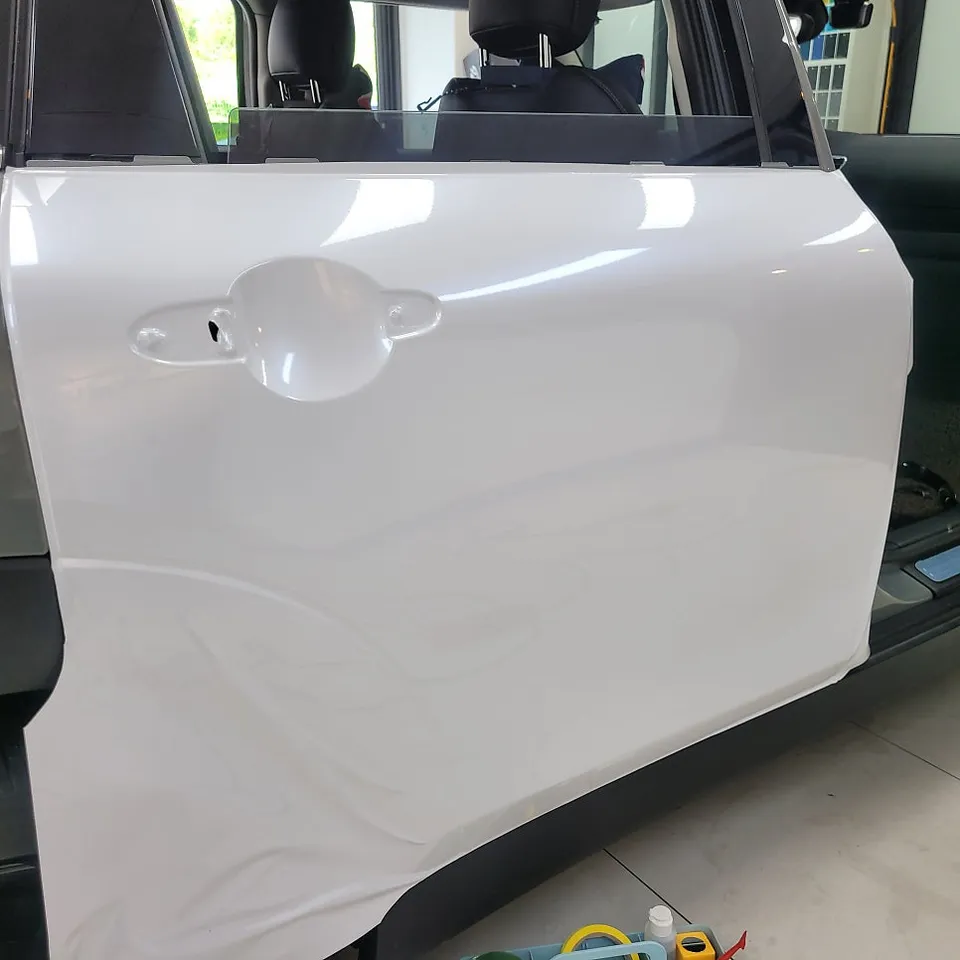 MINI Clubman vinyl wrap - MINI Clubman Vinyl Wrap Review: Pearl White Lower Wrap photo 5