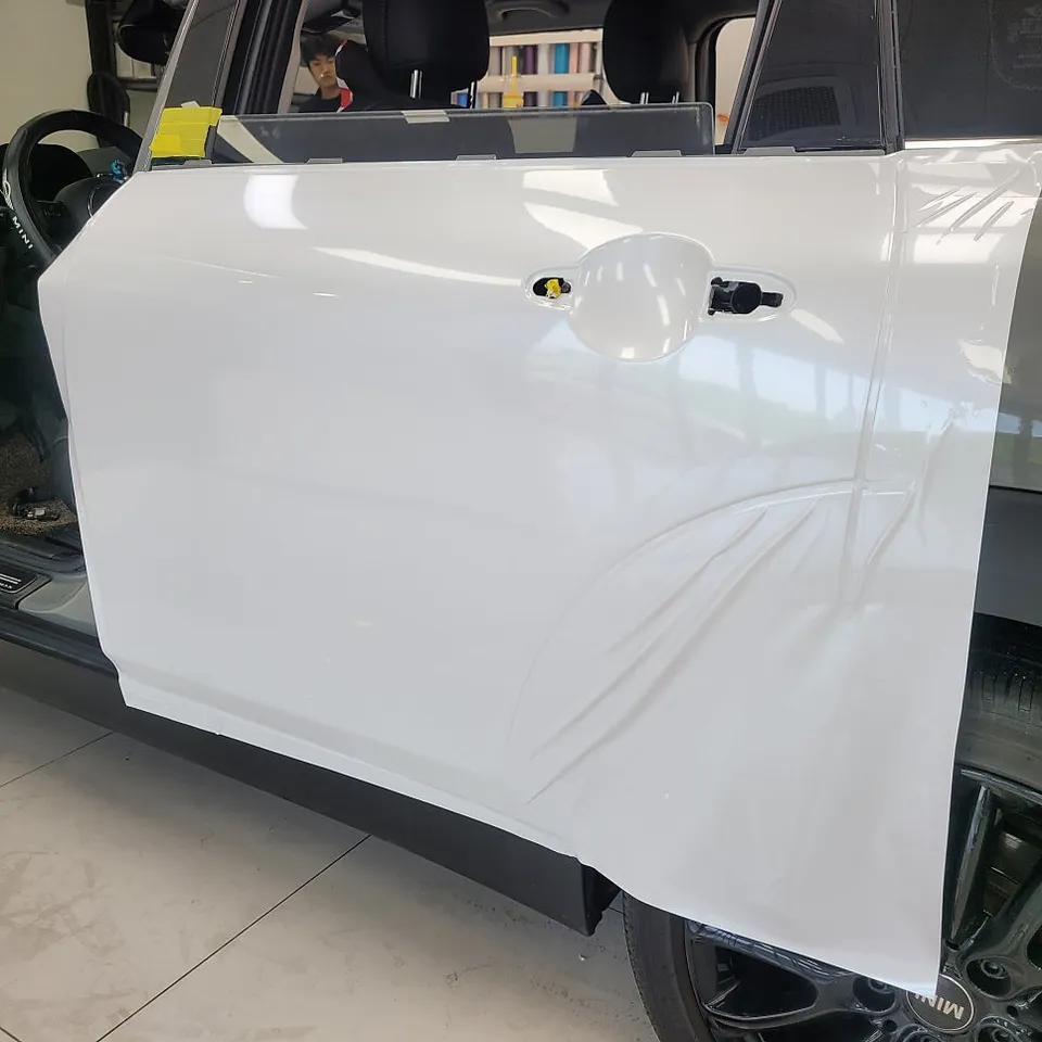 MINI Clubman vinyl wrap - MINI Clubman Vinyl Wrap Review: Pearl White Lower Wrap photo 6