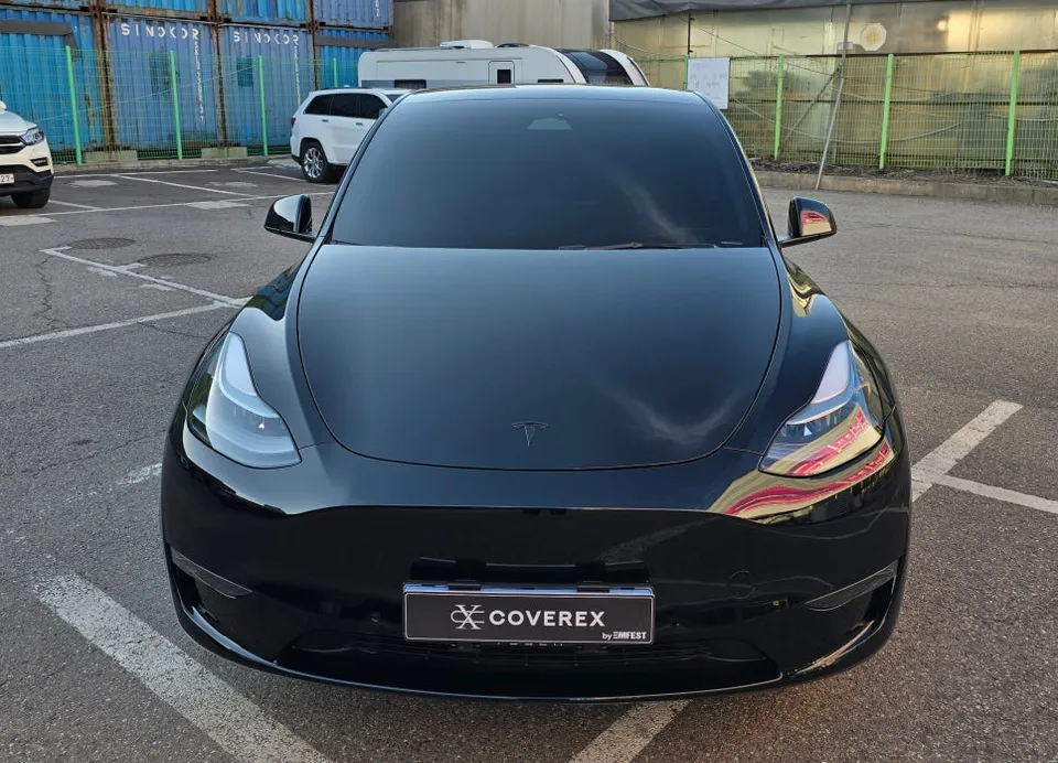 Tesla Model Y vinyl wrap - Tesla Model Y Vinyl Wrap Review: High Glossy Black Transformation photo 3
