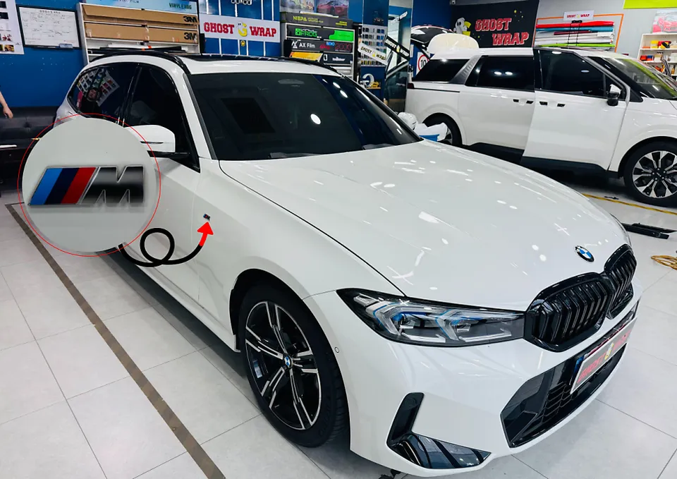BMW 3 Series vinyl wrap - BMW 3 Series Vinyl Wrap Review — Cost & Blackout photo 4