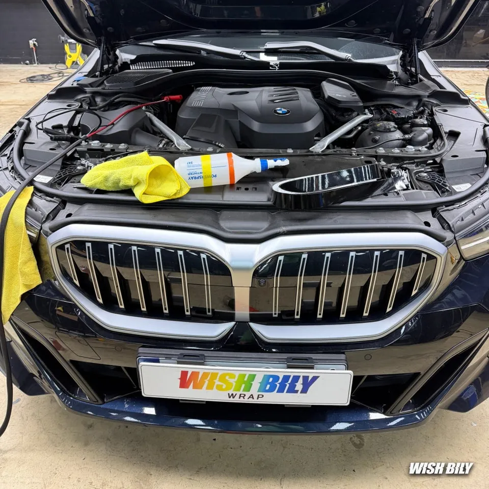 BMW 5 Series vinyl wrap - BMW 5 Series Chrome Wrap Review: All-Black Transformation photo 3