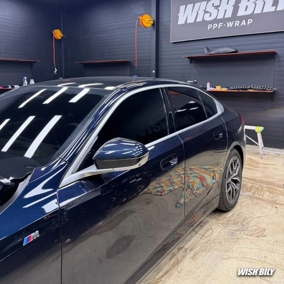 BMW 5 Series vinyl wrap - BMW 5 Series Chrome Wrap Review: All-Black Transformation photo 4