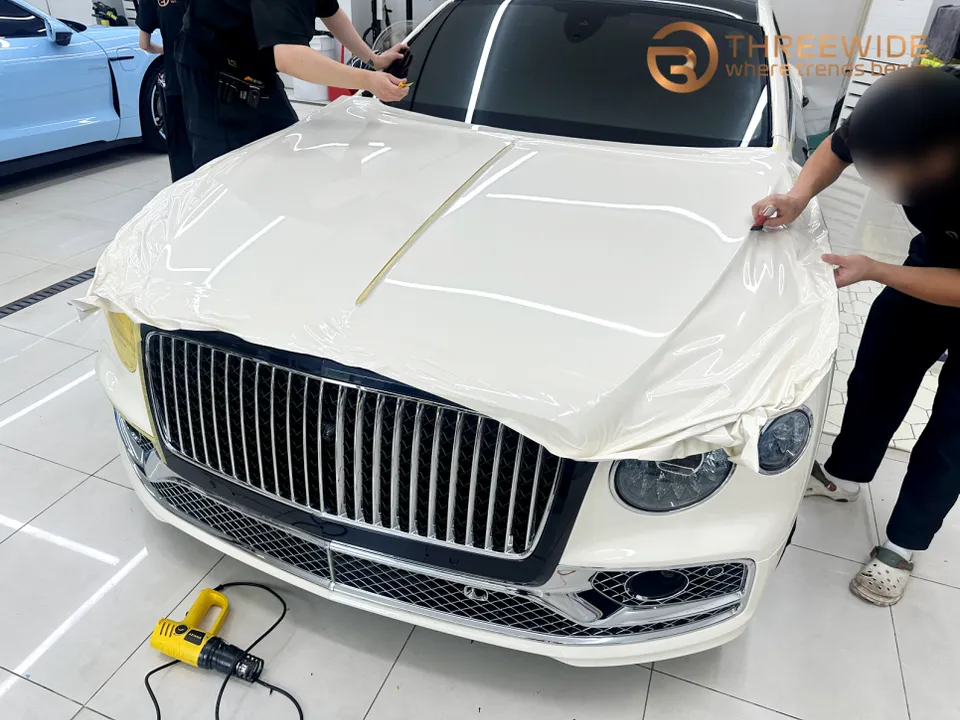 Bentley Flying Spurのカーラッピング事例｜ハイグロス・ベージュホワイト 施工写真 1-2