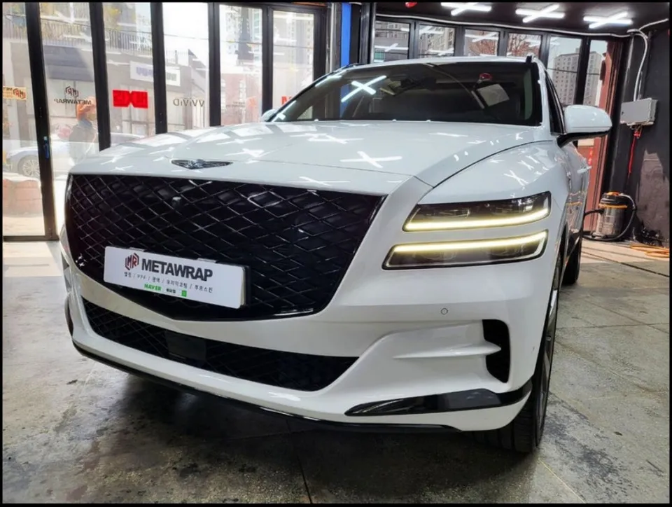 Genesis GV80 vinyl wrap - Genesis GV80 Chrome Delete Vinyl Wrap Review — Black Gloss Transformation photo 3