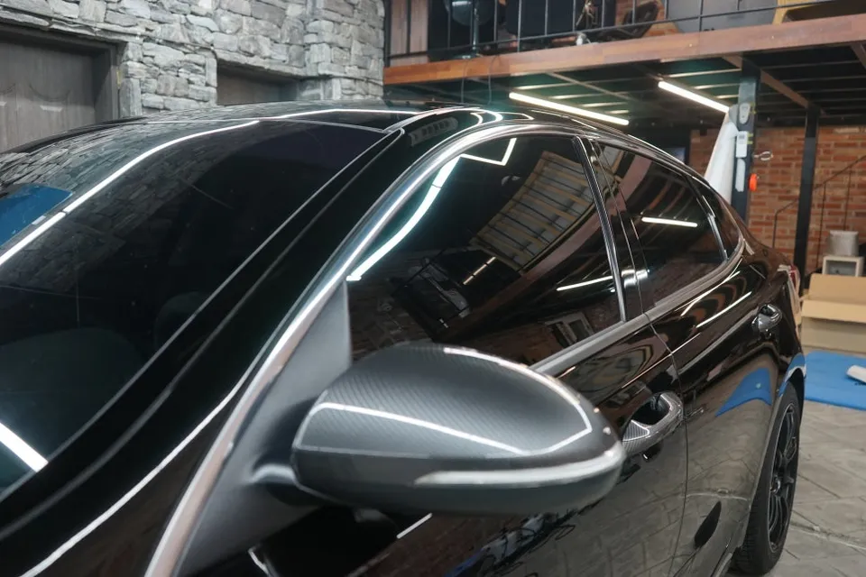 Kia K5 vinyl wrap - Kia K5 Vinyl Wrap Review: All-Black Chrome Delete Transformation photo 4