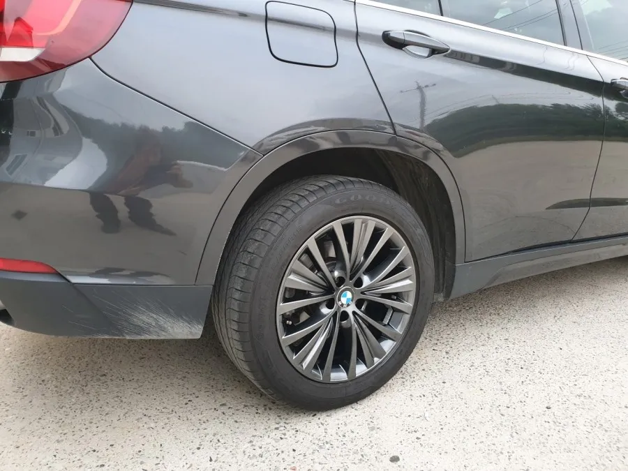 BMW X5 wheel repair - BMW X5 Wheel Repair Review — Flawless Black Metal Finish photo 4