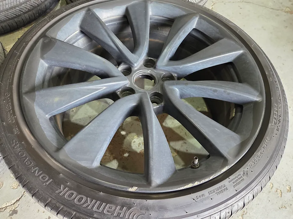 Tesla Model 3 wheel repair - Tesla Model 3 Wheel Repair Review - Matte Black Refinish photo 3
