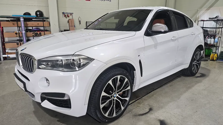 BMW X6 vinyl wrap - BMW X6 Vinyl Wrap Review: Dark Gray Color Change photo 3