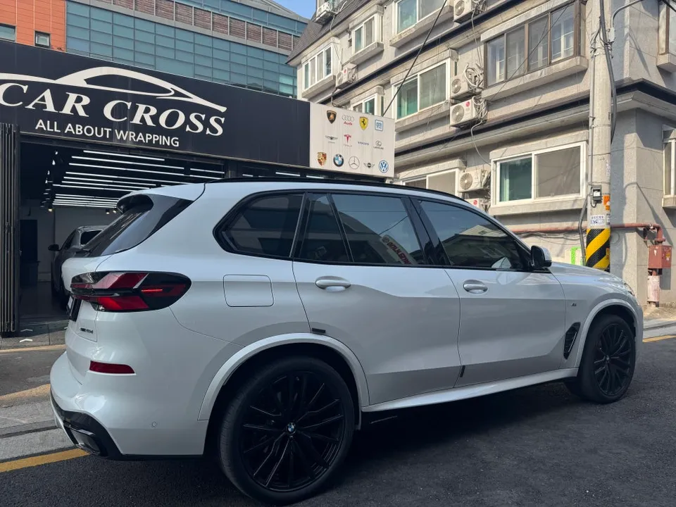 BMW X5 vinyl wrap - BMW X5 Vinyl Wrap Review: Real Carbon Interior Cost & Results photo 3
