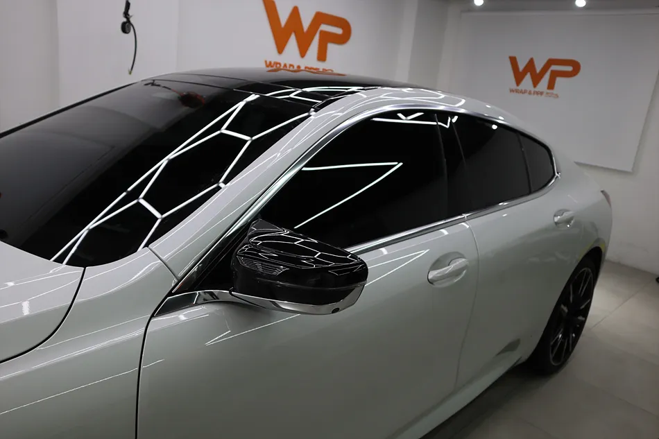 BMW 8 Series vinyl wrap - BMW 8 Series Vinyl Wrap Review: Chrome Delete for a Sleek Look photo 6