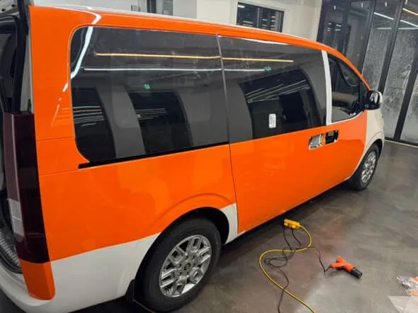 Hyundai Staria vinyl wrap - Hyundai Staria Vinyl Wrap Review: Orange Two-Tone Finish photo 4