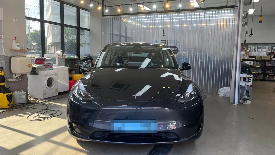 Tesla Model Y new car package - Tesla Model Y Stealth Gray New Car Inspection Review photo 3