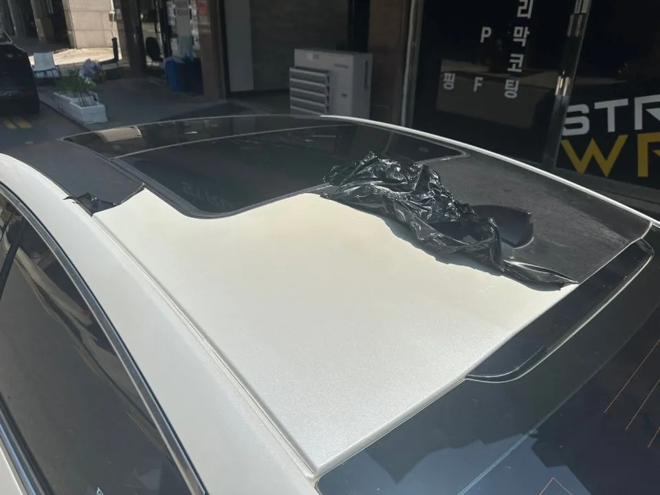 Chevrolet Malibuのカーラッピング事例|4年経過後の再施工 施工写真 2-1