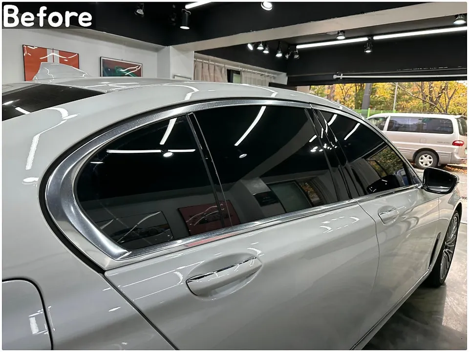 BMW 7 Series G11 vinyl wrap - BMW 7 Series Vinyl Wrap: Chrome Delete for a Sleek Look photo 4