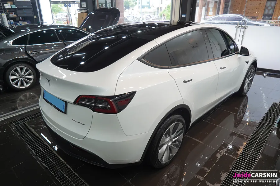 Tesla Model Y vinyl wrap - Tesla Model Y Satin Black Vinyl Wrap Review — Premium Finish photo 4