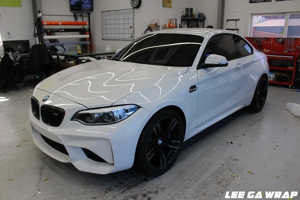 BMW M2 vinyl wrap - BMW M2 Vinyl Wrap Review: Matte Chrome Silver Installation & Cost photo 3