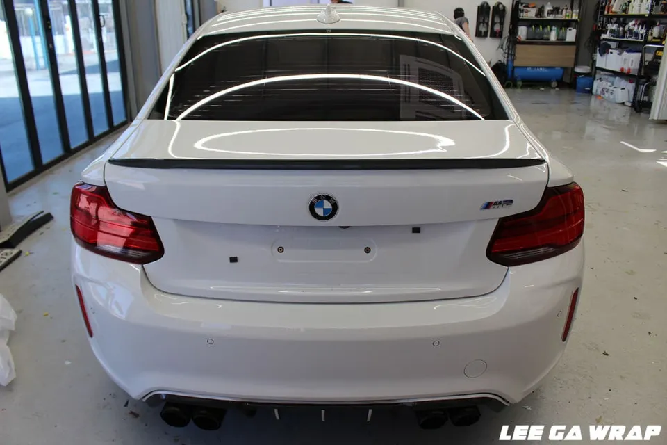 BMW M2 vinyl wrap - BMW M2 Vinyl Wrap Review: Matte Chrome Silver Installation & Cost photo 4