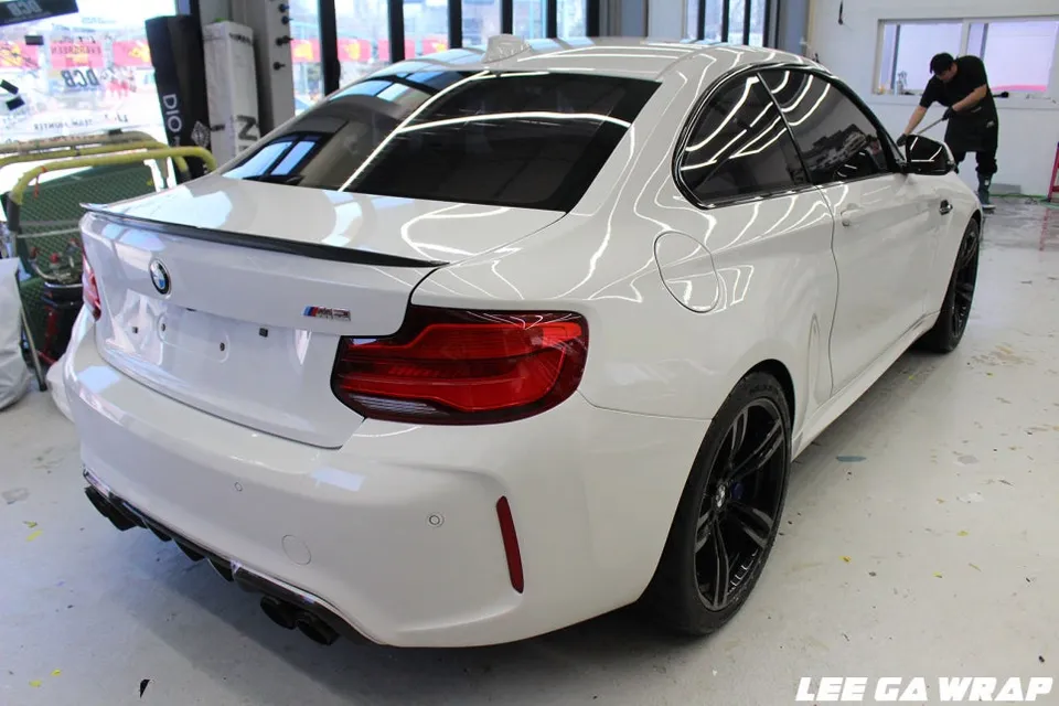BMW M2 vinyl wrap - BMW M2 Vinyl Wrap Review: Matte Chrome Silver Installation & Cost photo 5