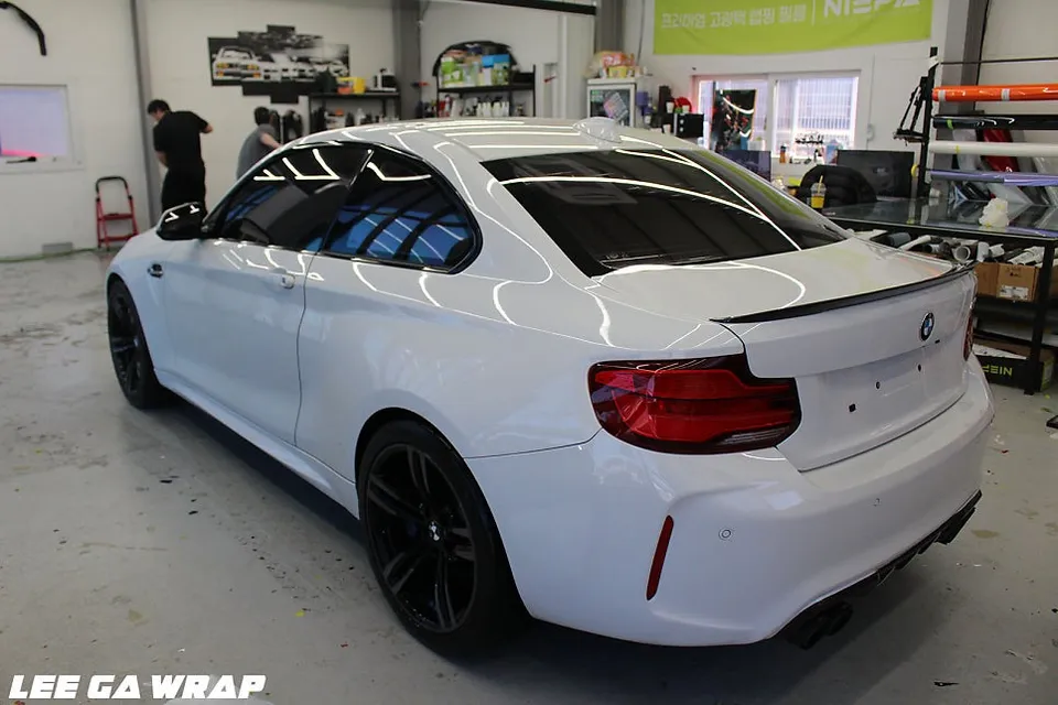 BMW M2 vinyl wrap - BMW M2 Vinyl Wrap Review: Matte Chrome Silver Installation & Cost photo 6