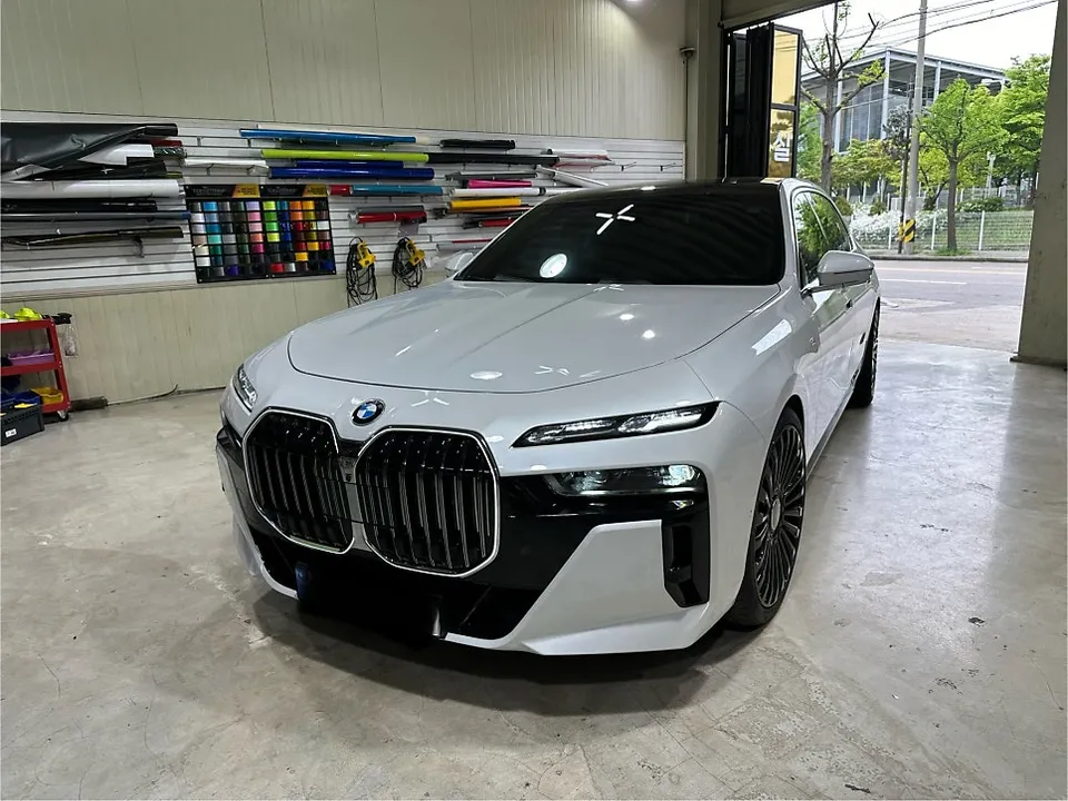 BMW 7 Series Vinyl Wrap Review: White & Black Two-Tone Elegance