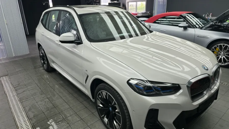 BMW iX3 window tinting installation result