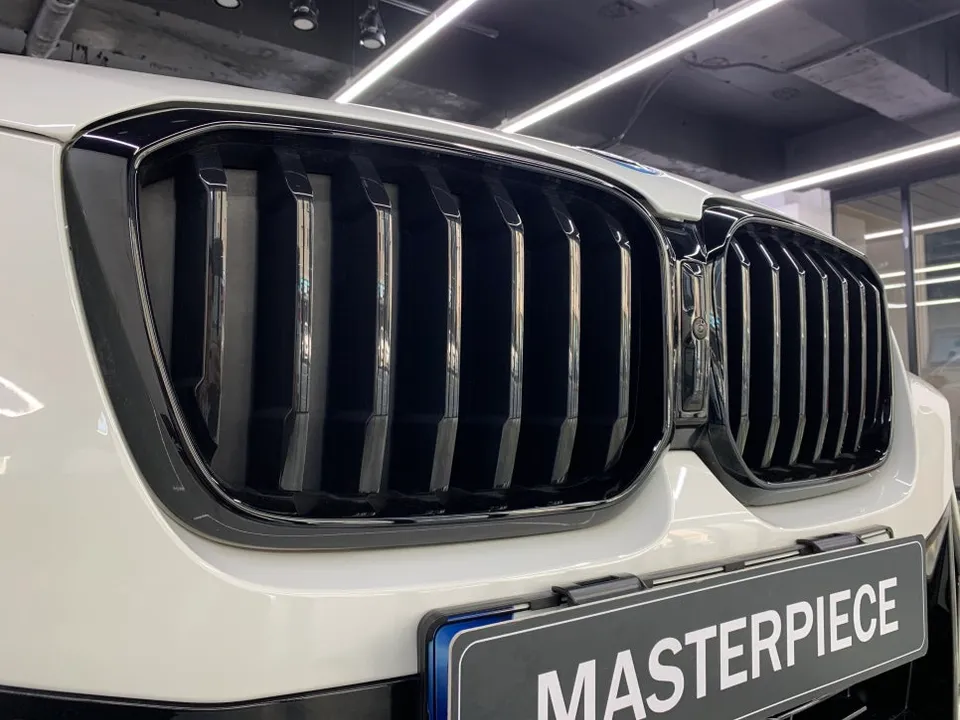 BMW X3 vinyl wrap - BMW X3 Vinyl Wrap Review: Matte Carbon Style Upgrade photo 5