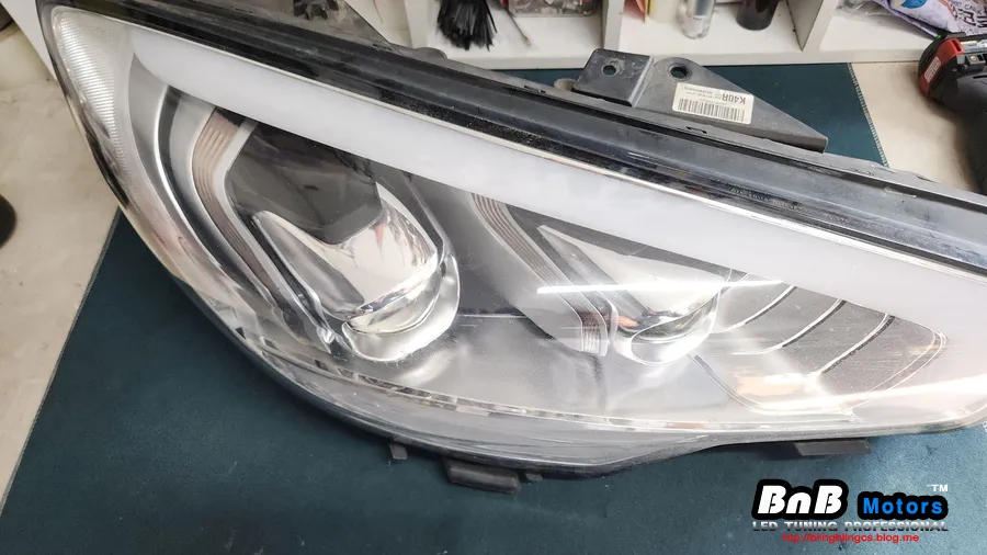 Kia K900 body repair - Kia K900 Headlight Adjustment Repair Review photo 5