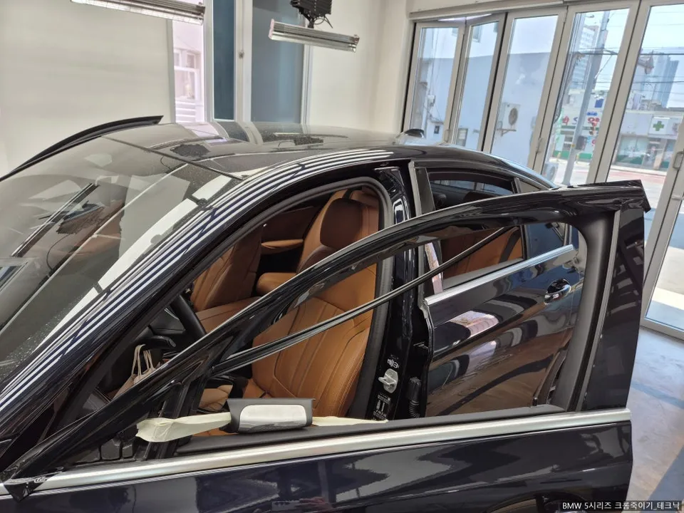 BMW 5 Series vinyl wrap - BMW 5 Series Vinyl Wrap Review: Chrome Delete Cost & Results photo 4