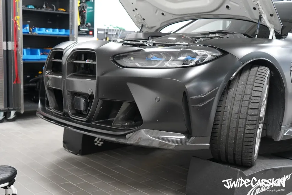 BMW M3 vinyl wrap - BMW M3 Satin Black Vinyl Wrap Repair Review photo 4