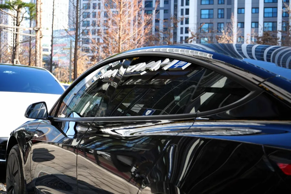 Tesla Model 3 window tinting - Tesla Model 3 Window Tinting Review: Half vs. Full Install photo 4
