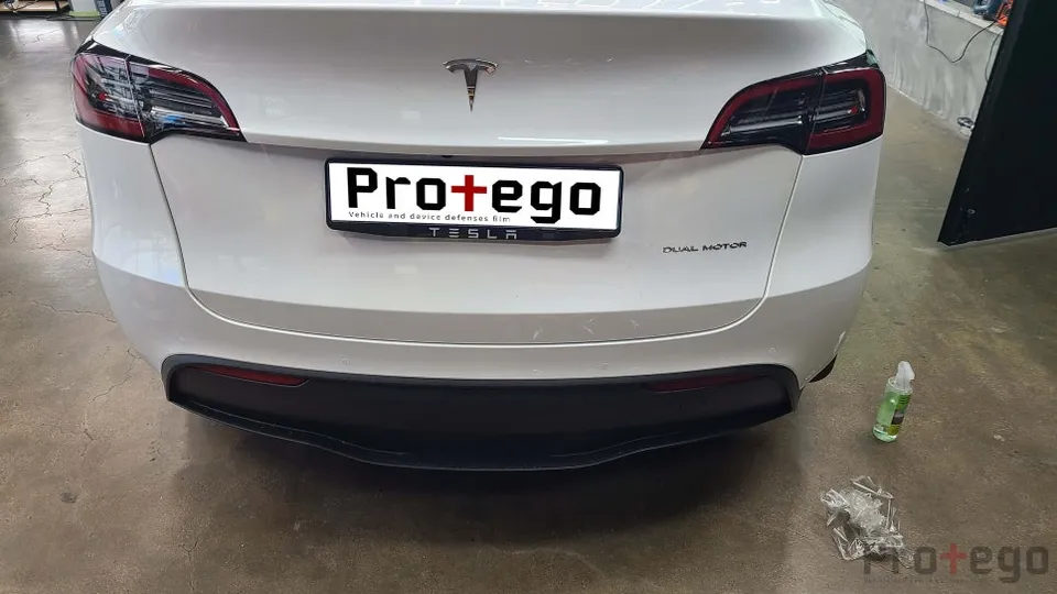 Tesla Model Y ppf - Tesla Model Y PPF Reapplication: Yellowed Film Replaced photo 6