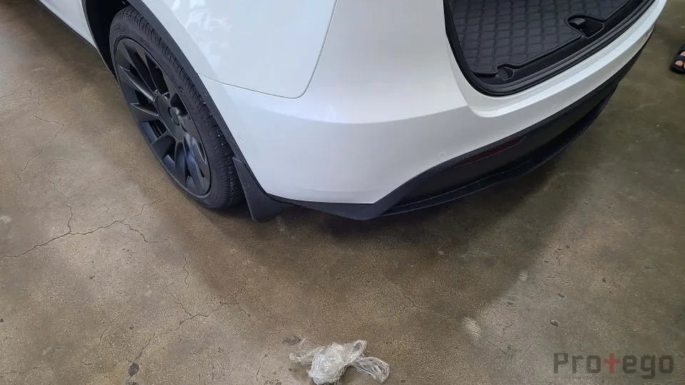 Tesla Model Y ppf - Tesla Model Y PPF Reapplication: Yellowed Film Replaced photo 7