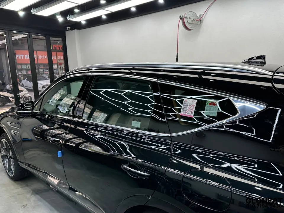 Genesis GV80 vinyl wrap - Genesis GV80 Chrome Delete Wrap Review: All-Black Transformation photo 3