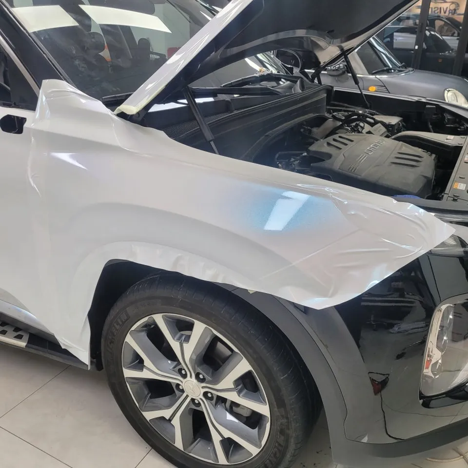 Hyundai Palisadeのカーラッピング事例|ブルーパールホワイト 施工写真 2-3