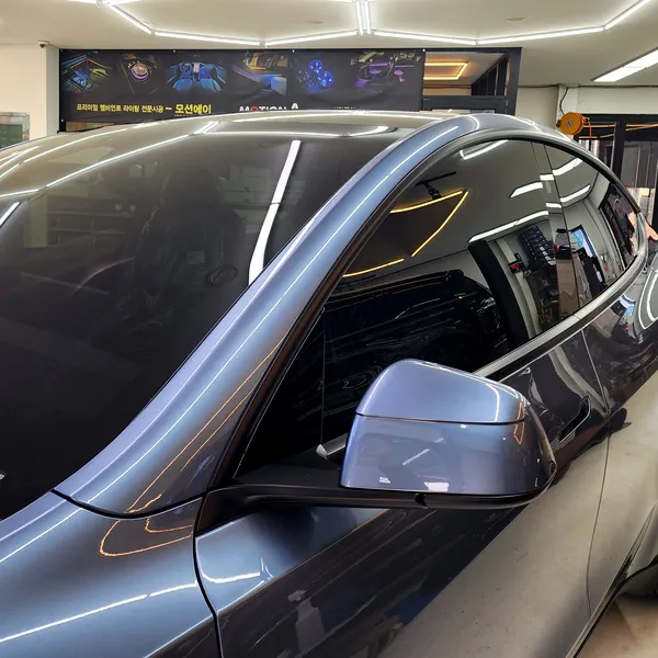 Tesla Juniper window tinting installation result