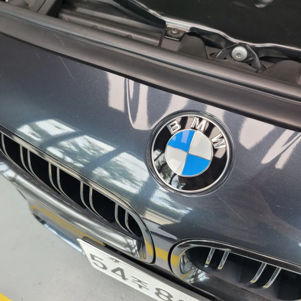 BMW M5 vinyl wrap - BMW M5 Vinyl Wrap Review: Gloss Orange Installation & Cost photo 4