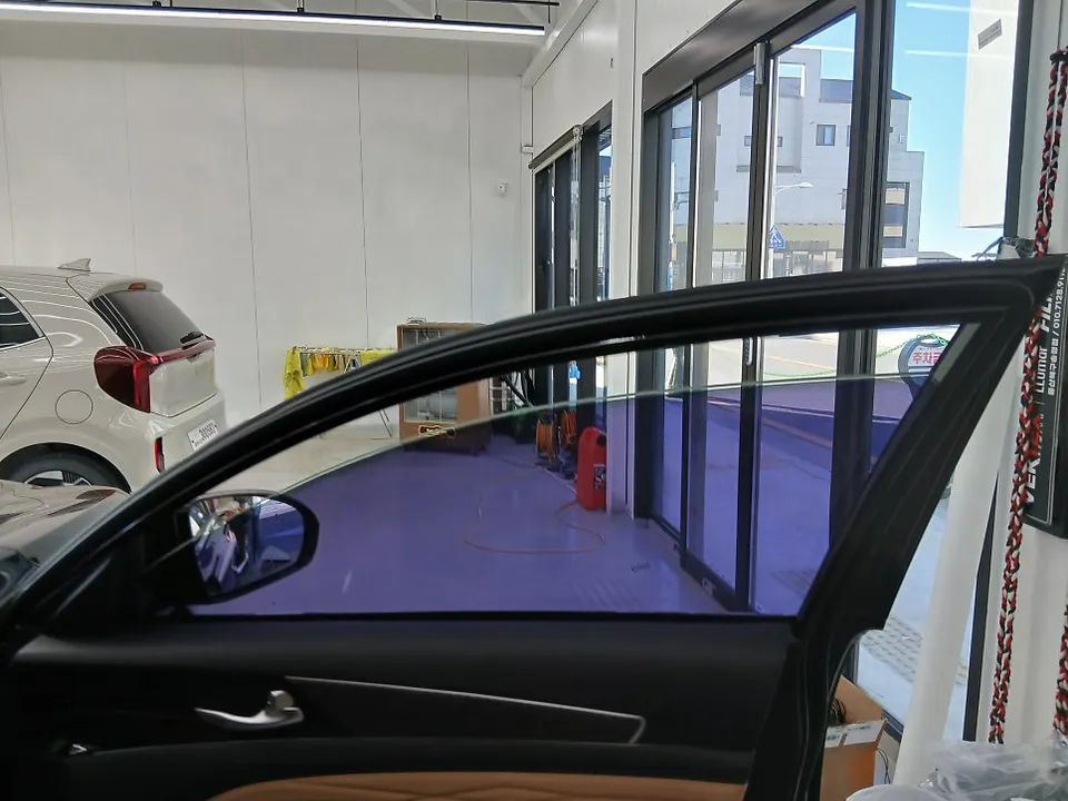 Kia K7 Window Tinting Review: Fantastic Re-application photo 3