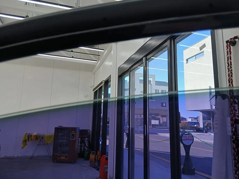 Kia K7 Window Tinting Review: Fantastic Re-application photo 4