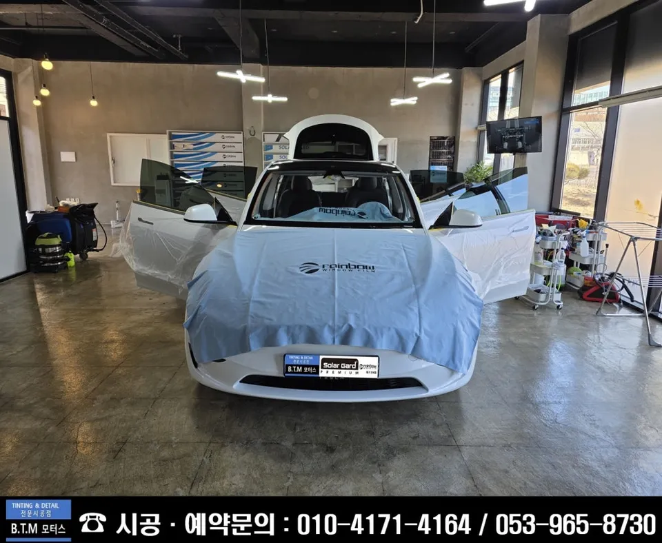 Tesla Model Y window tinting - Tesla Model Y Window Tinting Review: BTM Film Re-application photo 3