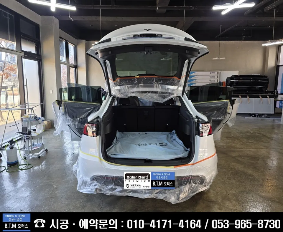 Tesla Model Y window tinting - Tesla Model Y Window Tinting Review: BTM Film Re-application photo 4