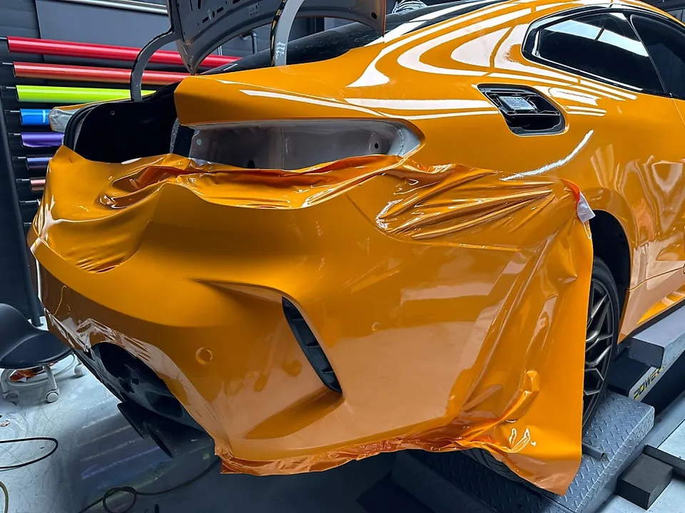 BMW 4 Seriesのカーラッピング事例｜パパイヤオレンジの輝き 施工写真 1-3