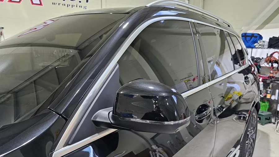 BMW X7 vinyl wrap - BMW X7 Vinyl Wrap Review: Chrome Delete for a Sleek Black Look photo 3