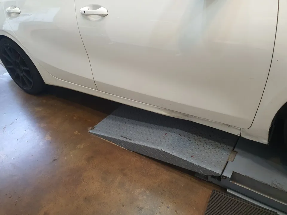 Kia K3 body kit - Kia K3 Body Kit Installation Review: Sporty Side Skirts photo 3