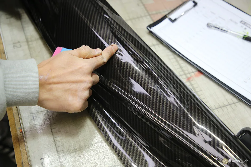 BMW 5 Series vinyl wrap - BMW 5 Series Vinyl Wrap Review: Gloss Carbon Interior Upgrade photo 5