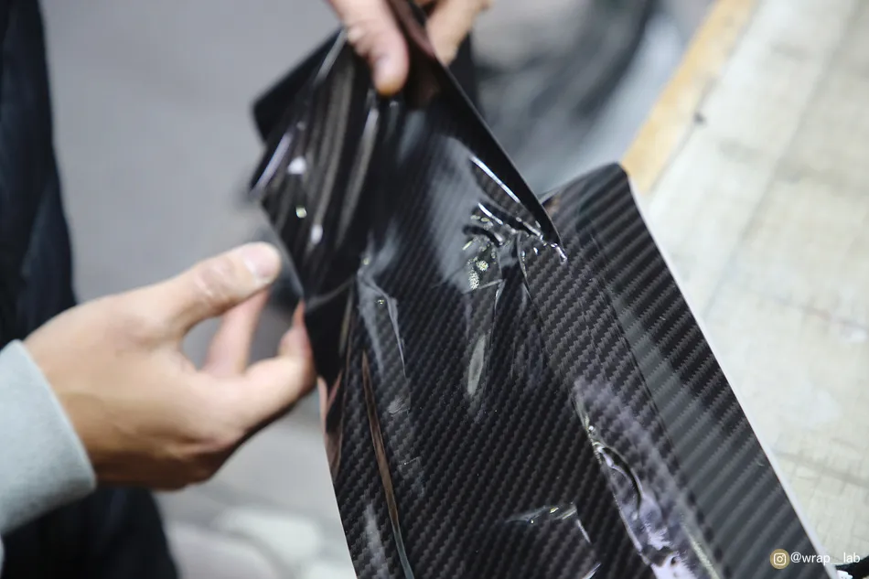 BMW 5 Series vinyl wrap - BMW 5 Series Vinyl Wrap Review: Gloss Carbon Interior Upgrade photo 6