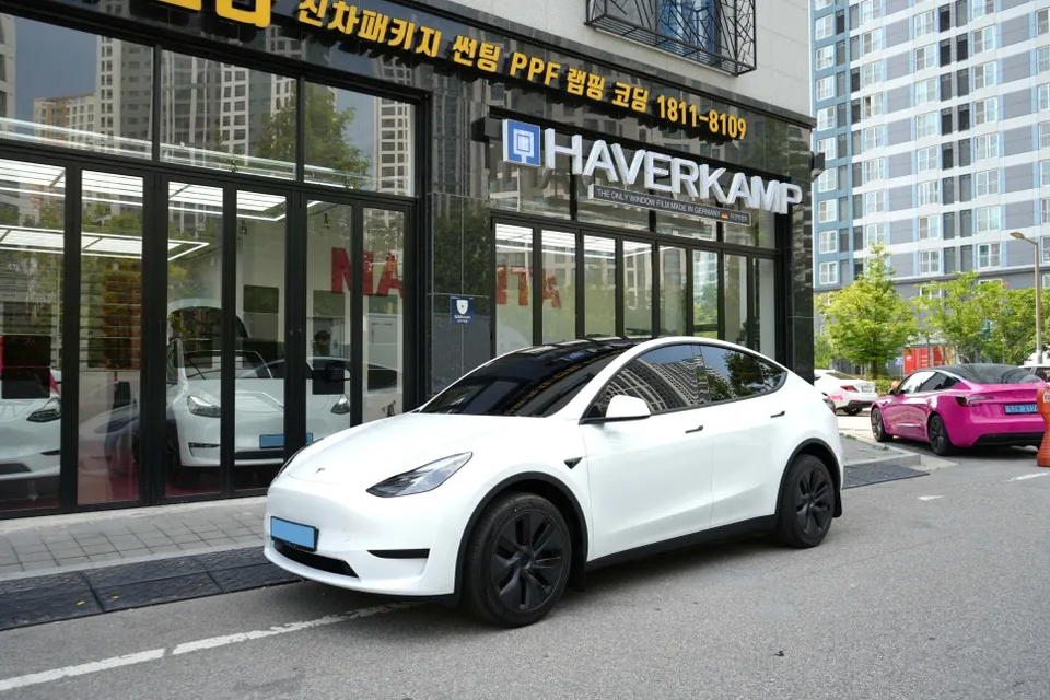 Tesla Model Y New Car Package Review: Cost & Results photo 1