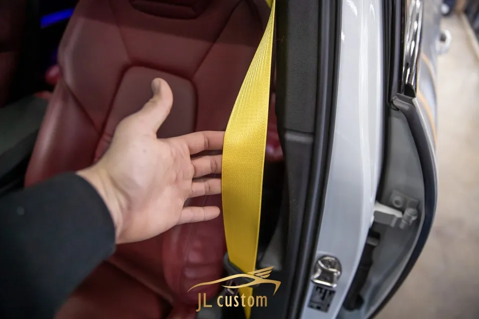 Porsche Cayenne E3 interior customization - Porsche Cayenne E3 Interior Customization: Yellow Seatbelt Upgrad photo 4