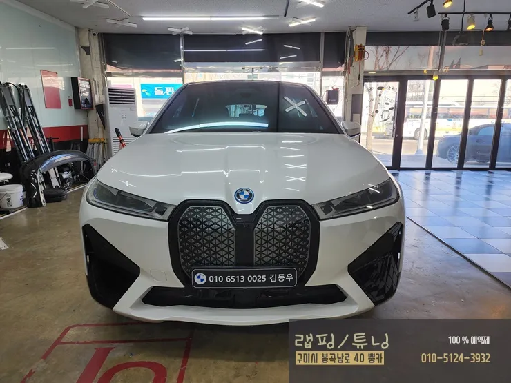 BMW iXのカーラッピング事例|ミッドナイトパープルへの変貌 施工写真 3-1