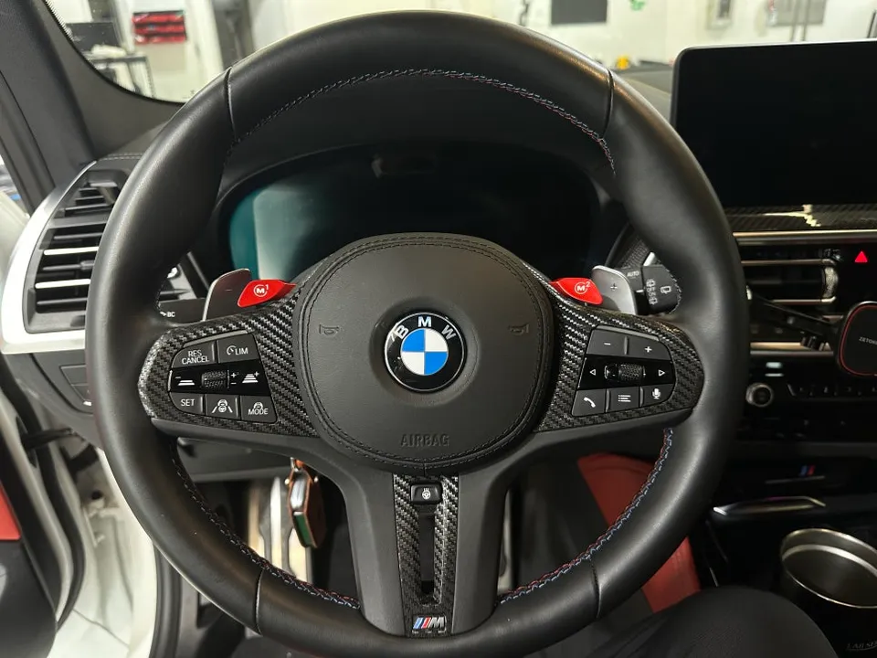 BMW X3のカーラッピング事例|カブリオブラックで高級感アップ 施工写真 1-3